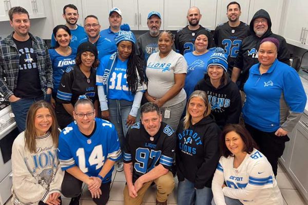 Turris-emplyees-in-detroit-lions-gear